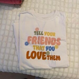 White Graphic Tee with Colorful Text